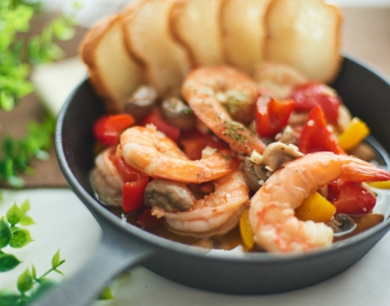 季節⾷材のアヒージョの画像